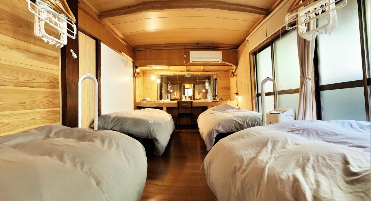 奄美ゲストハウス Hub A Nice Inn Setouchi  Exterior foto