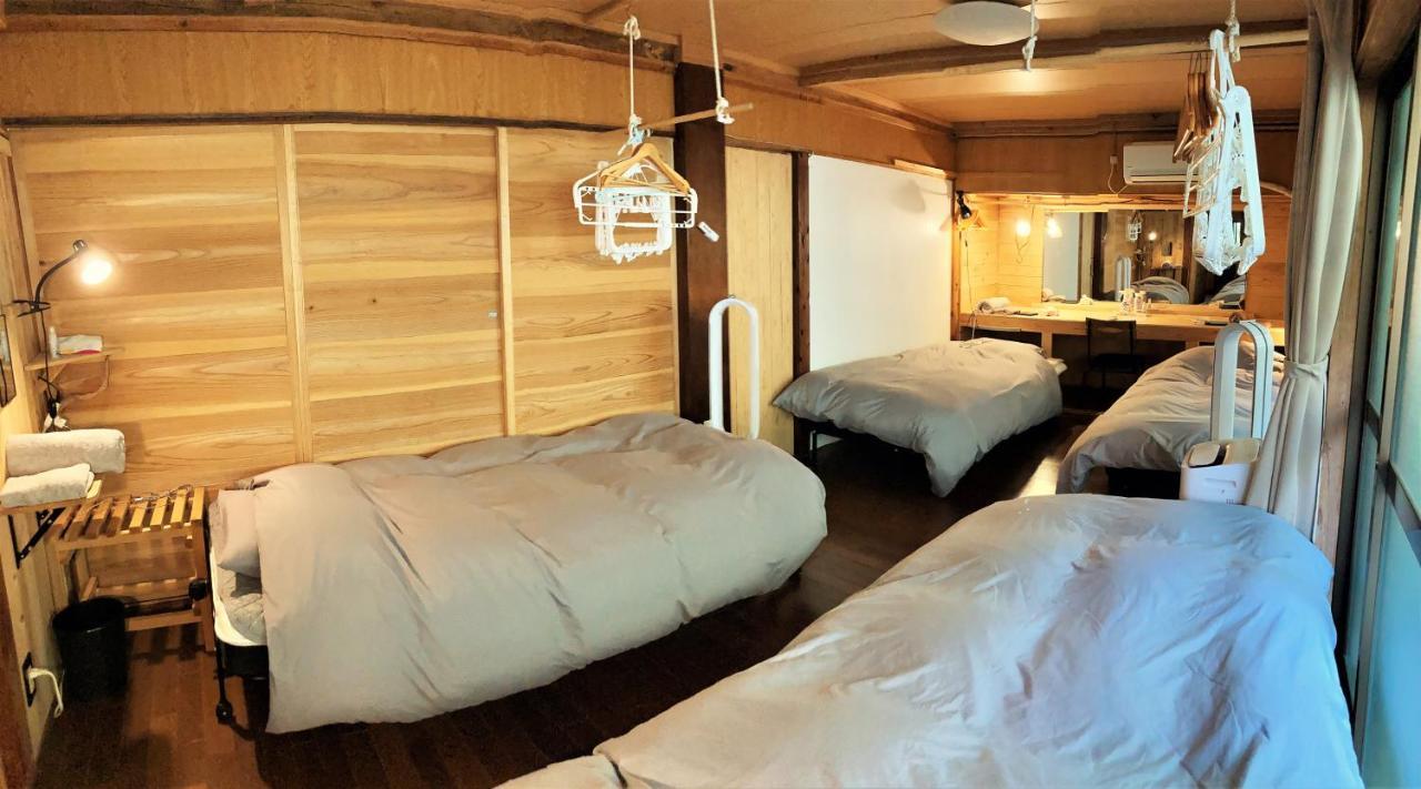 奄美ゲストハウス Hub A Nice Inn Setouchi  Exterior foto