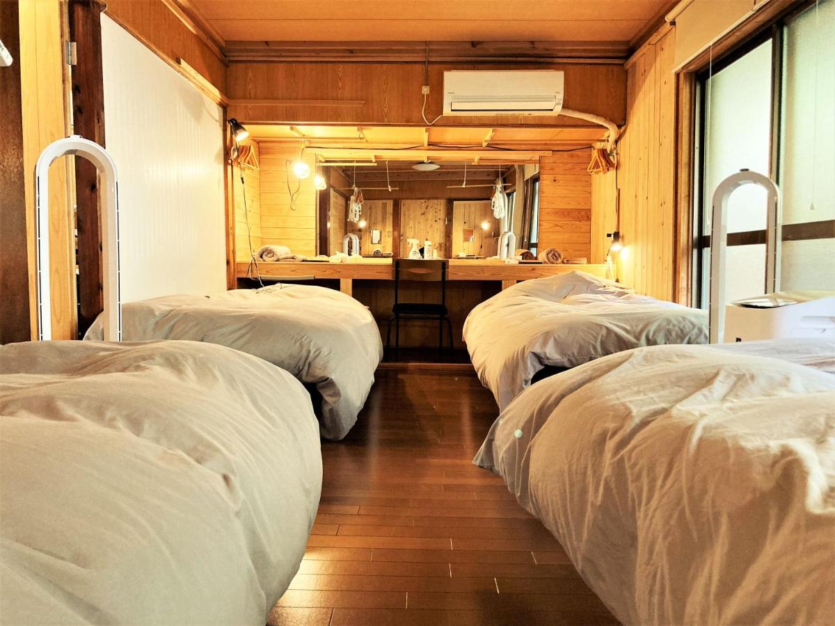 奄美ゲストハウス Hub A Nice Inn Setouchi  Exterior foto